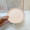 Pink speckled ceramic plate