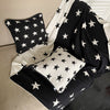 Knitted star cushion - double sided
